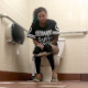 A girl with green-dyed hair sits down on a toilet in a fast food restaurant public restroom. She pisses, farts and takes a shit. All is audible. She wipes when finished. Presented in 720P HD. Over 3 minutes.
